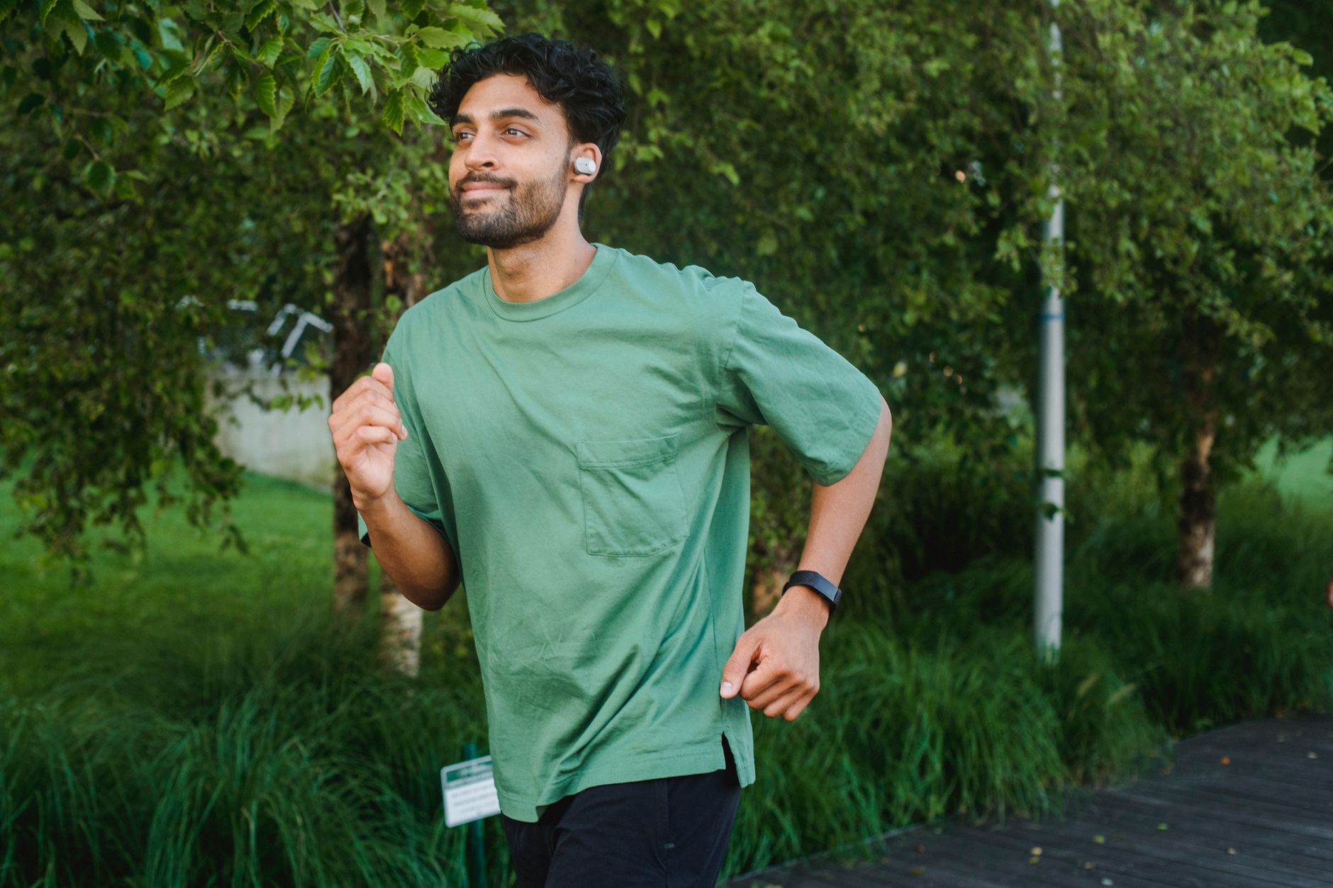 Best Smartwatches for 2026: Your Ultimate Wearable Guide 6 A runner using their smartwatch for tracking during exercise.