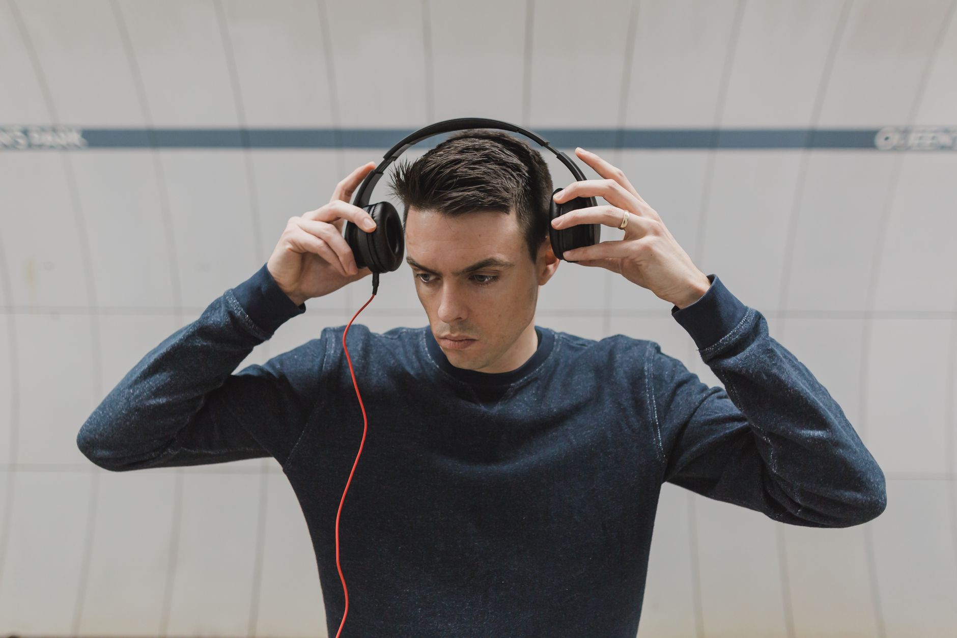 Best Noise-Cancelling Headphones Under $200 in 2026 2 A person enjoying music with noise-cancelling headphones under $200