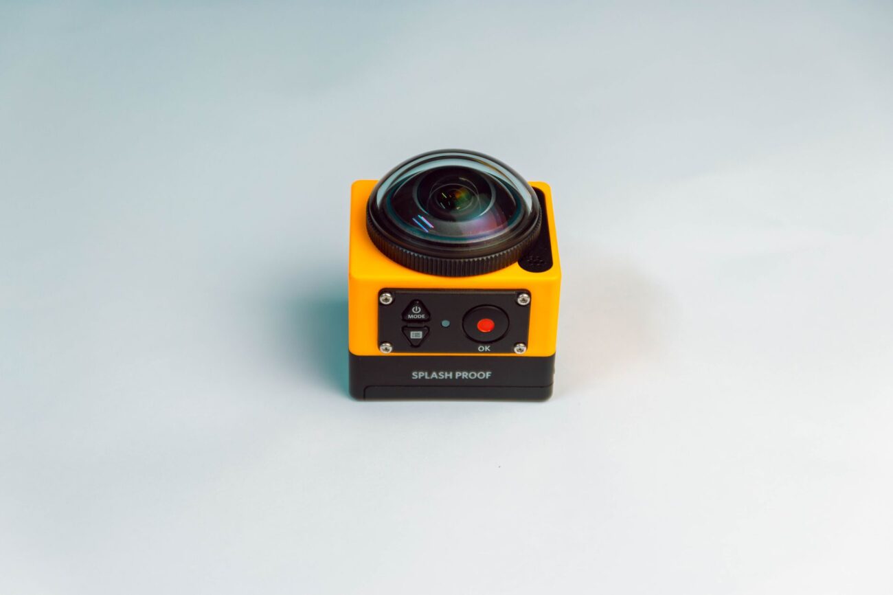 A person holding one of the best action cameras ready to capture adventure