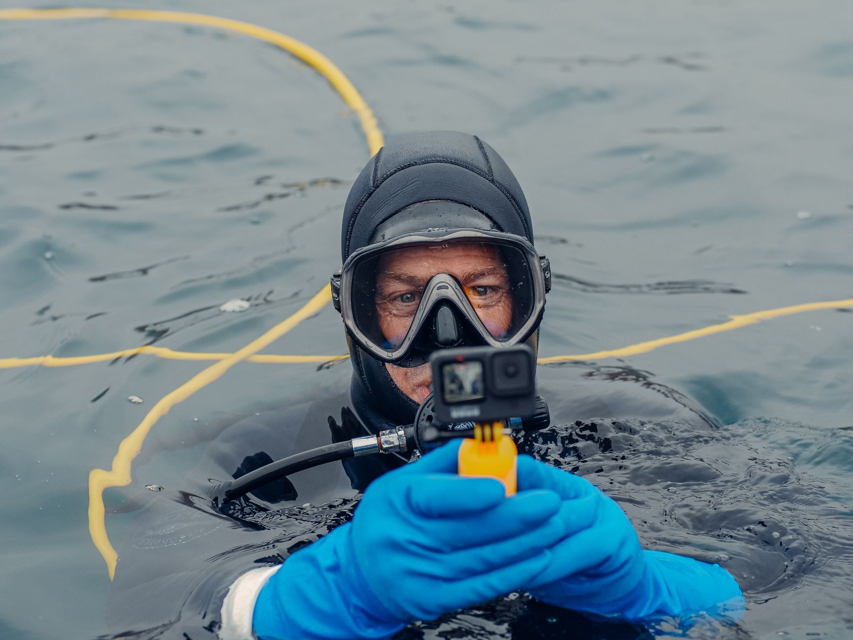 An action camera filming underwater
