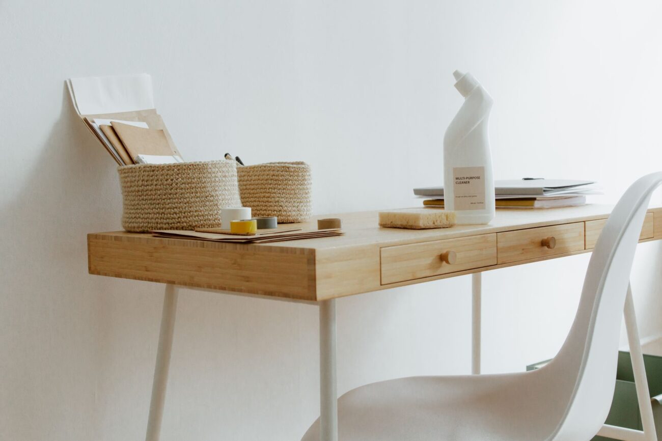 A sleek modern air purifier operating in a clean living room, symbolizing the best air purifiers for a healthy home.
