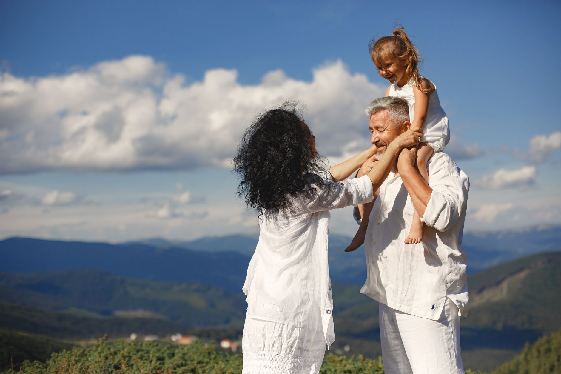 Happy family enjoying fresh, clean air in their home, benefiting from an efficient air purification system.