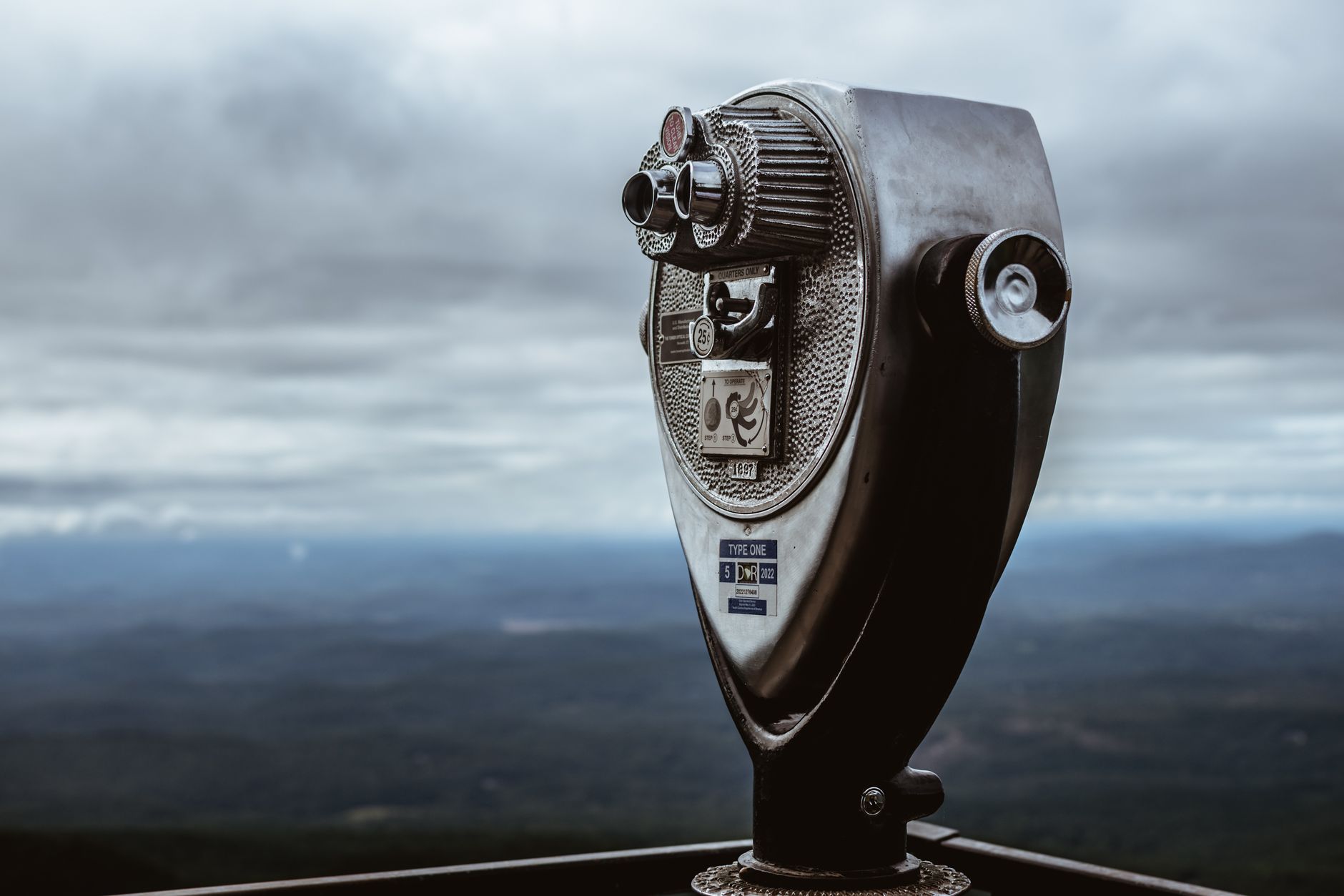 Zoom In on Perfection: The Best Binoculars for 2026 Revealed 2 A person using best binoculars to view distant wildlife in a natural setting.
