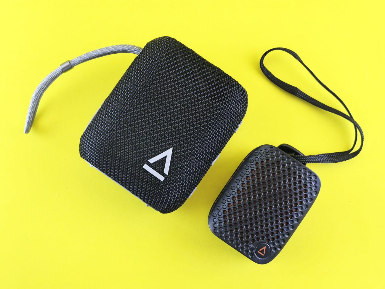 A person enjoying music from the best bluetooth speaker outdoors.