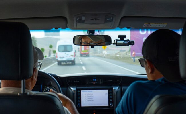 Drive Smarter, Drive Safer: Best Dash Cams for 2026 Reviewed 3 A close-up view of a dash cam mounted on a car windshield, capturing the road ahead, highlighting the importance of the best dash cams for safety.