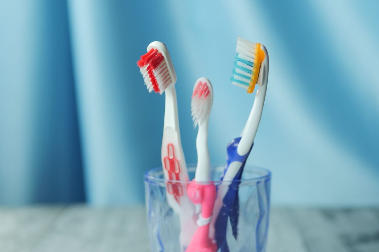 A person using one of the best electric toothbrushes for a clean smile