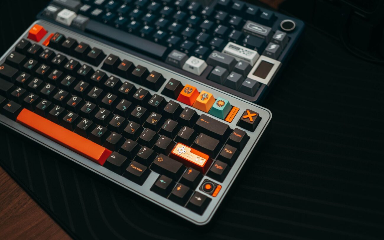 Unlock Peak Performance: The Best Mechanical Keyboards for 2026 1 A person's hands typing on one of the best mechanical keyboards with RGB lighting.