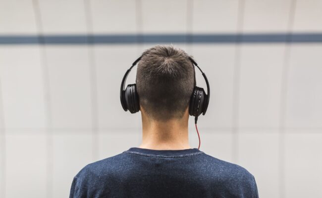 Best Wireless Earbuds for 2026: Your Ultimate Audio Upgrade 26 Person enjoying music with best wireless earbuds