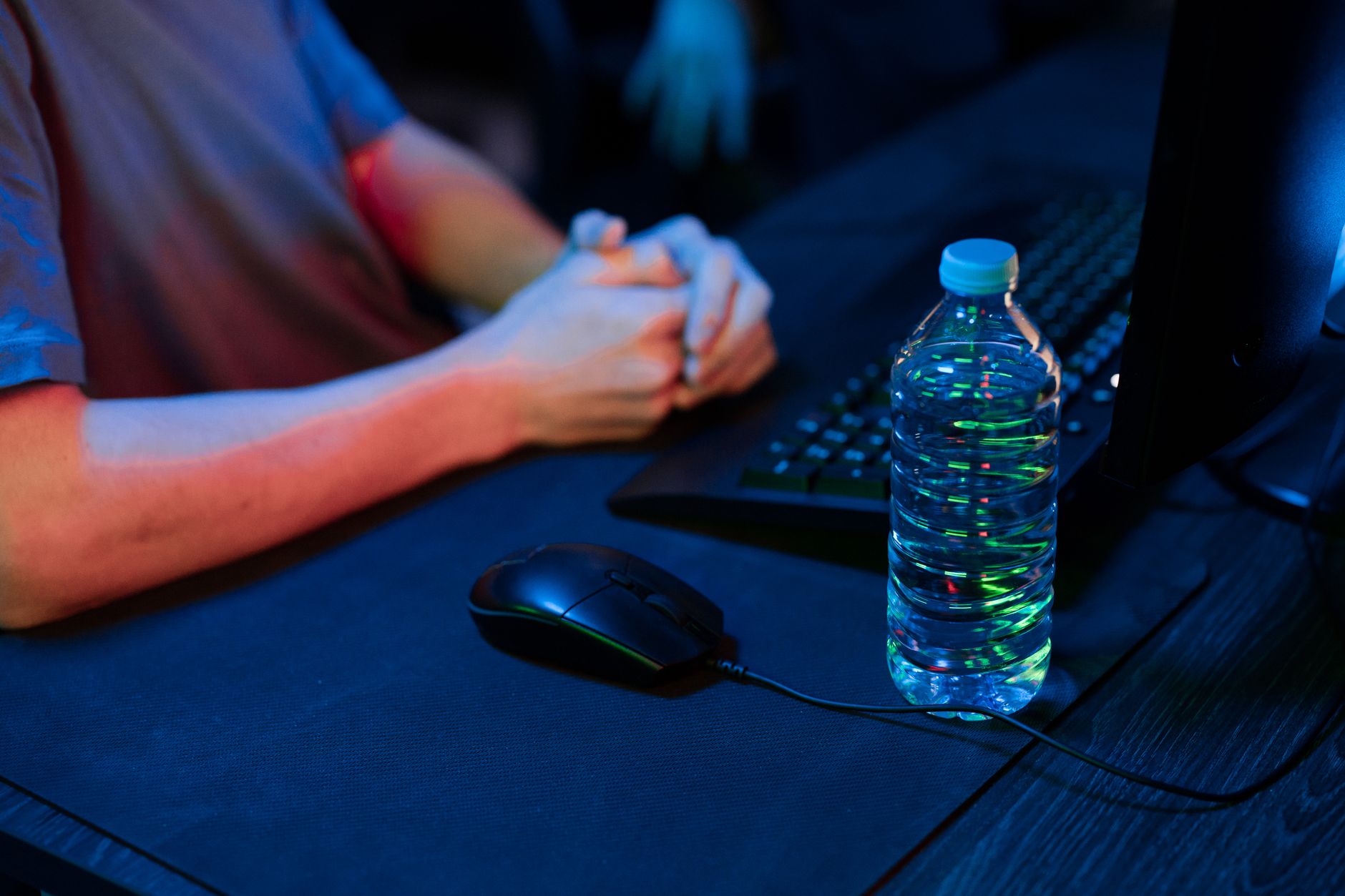 Best Budget Gaming Mice for 2026: Dominate Without Breaking the Bank 3 Close-up of a gamer's hand on a gaming mouse during intense gameplay.