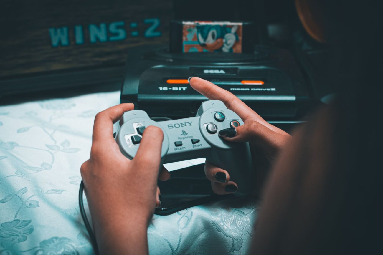 Level Up Your Play: Best Handheld Gaming Consoles for 2026 1 A person intently playing on one of the best handheld gaming consoles.
