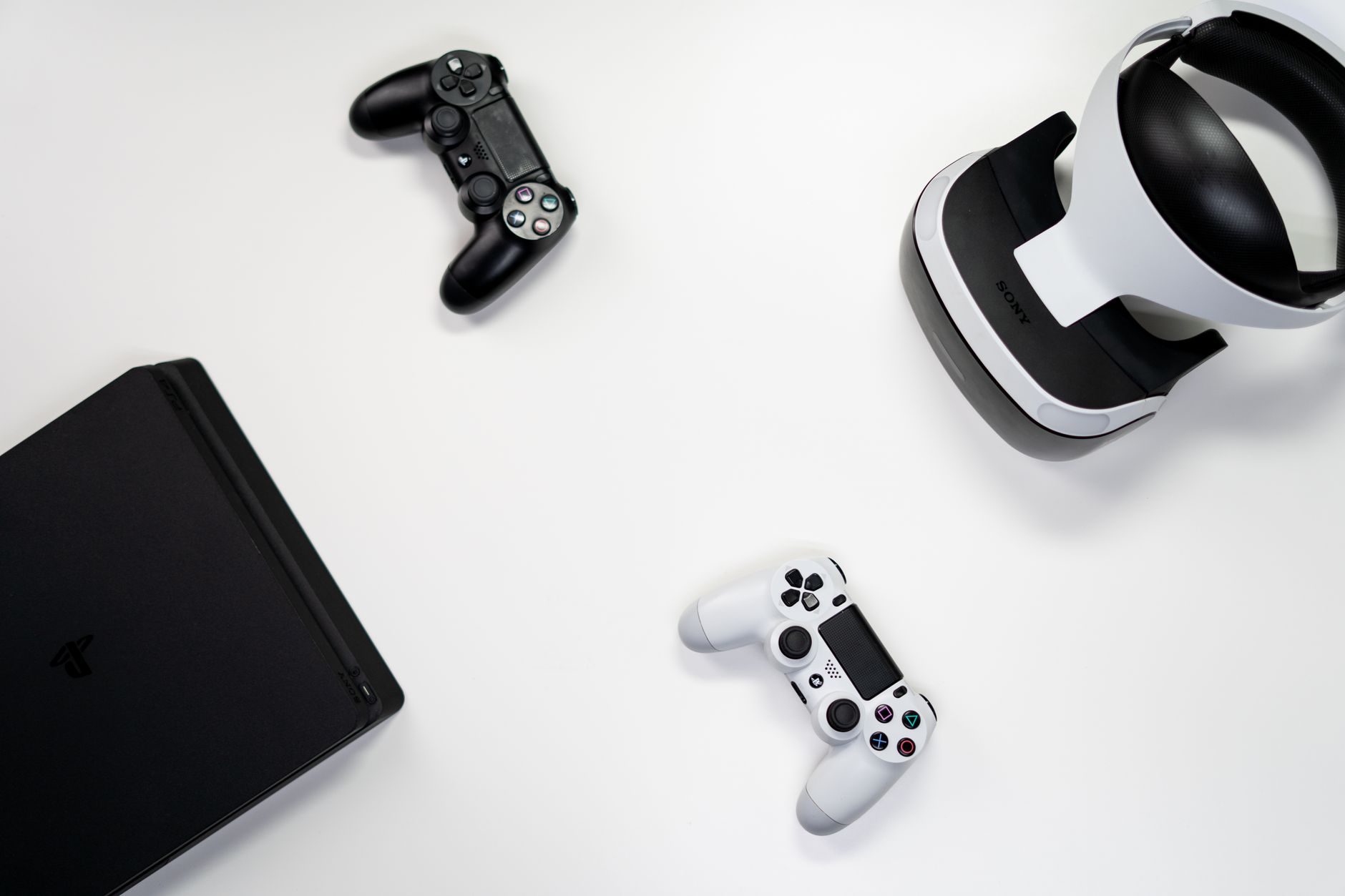 Level Up Your Play: Best Handheld Gaming Consoles for 2026 3 A collection of different portable gaming devices on a table.