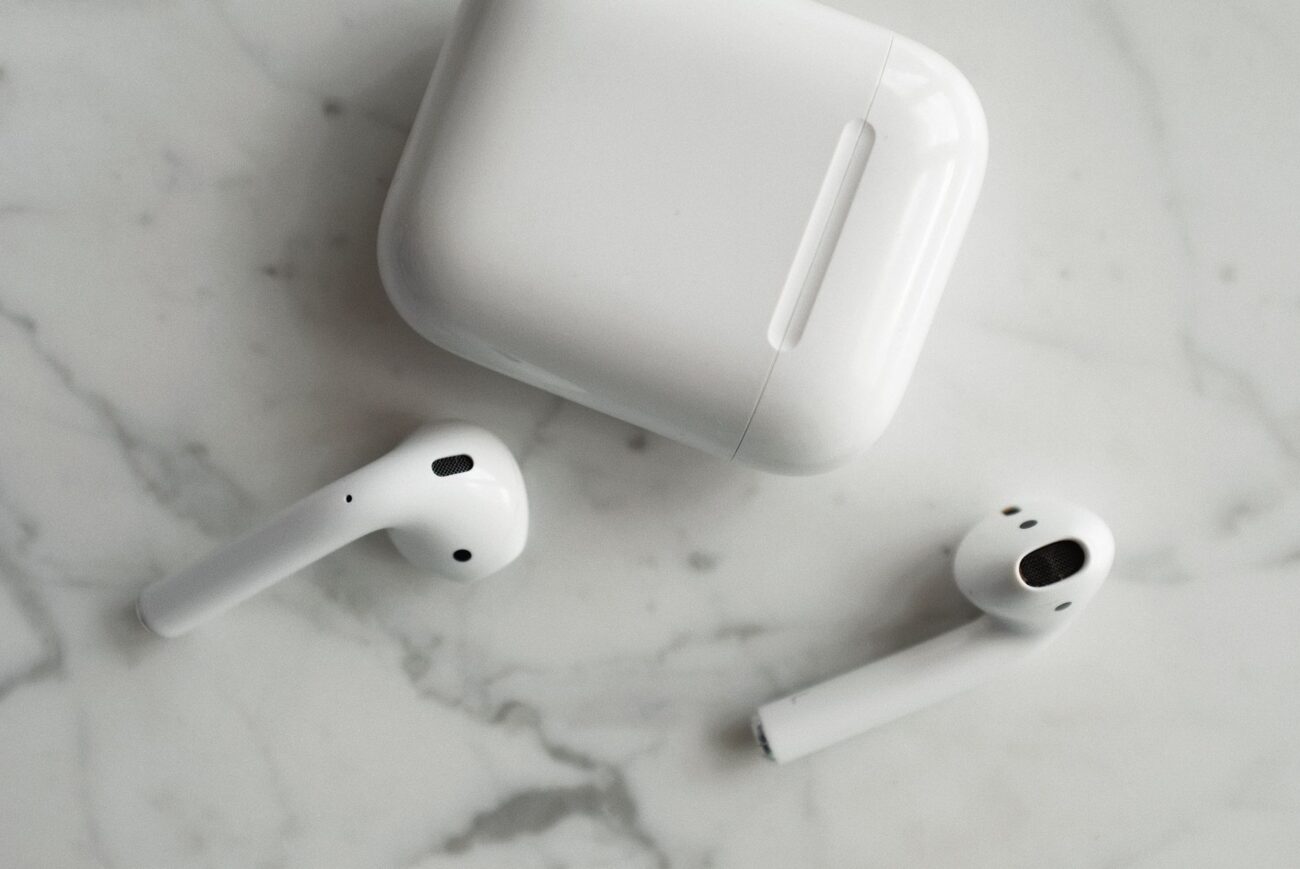 AirPods Ultra Reportedly Set for Launch Next Month 1 person wearing wireless earbuds during airpods ultra launch news