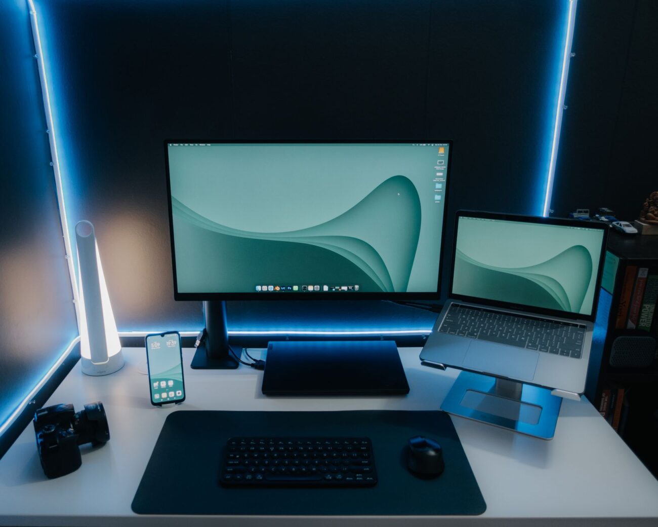 Crystal Clarity: Best 4K Monitors for 2026 1 A person focused on their work at a desk with the best 4K monitors for productivity