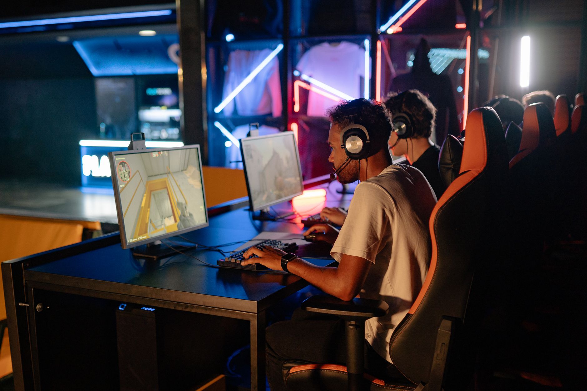 Crystal Clarity: Best 4K Monitors for 2026 3 A vibrant gaming setup with multiple high-resolution monitors