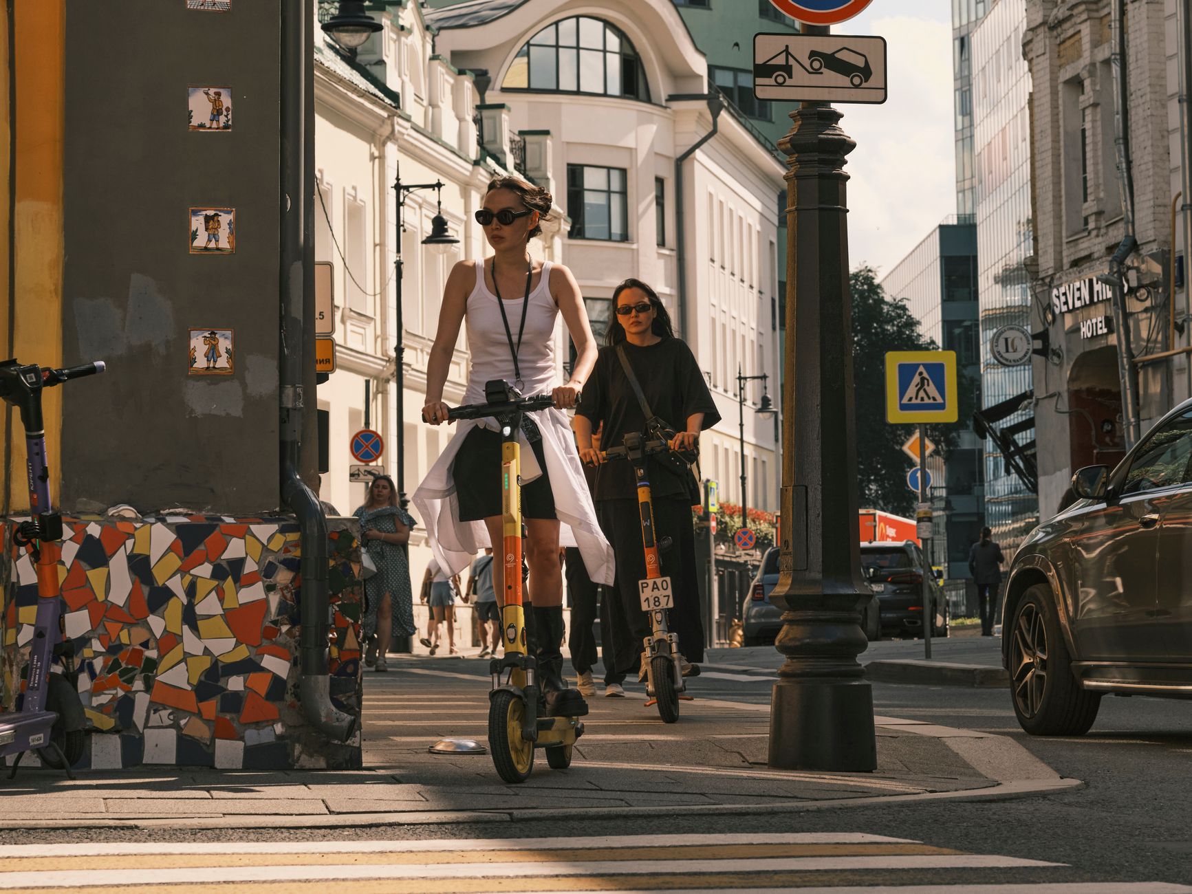 Best Electric Scooters for 2026: Top 5 Tested Rides 3 sleek electric scooter parked near modern office building