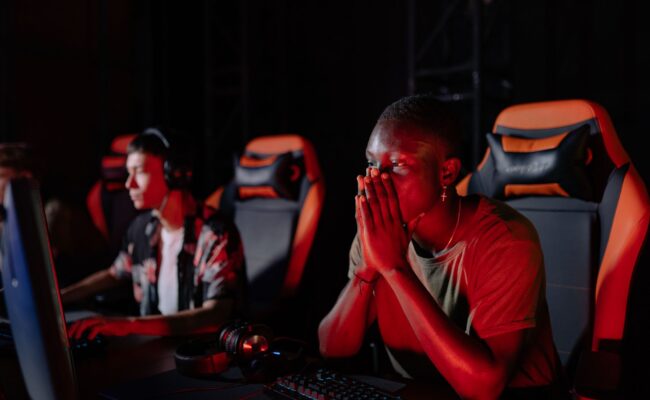 Sit Like a Pro: The Best Gaming Chairs for 2026 Revealed 1 A gamer sitting comfortably in one of the best gaming chairs, focused on their screen.
