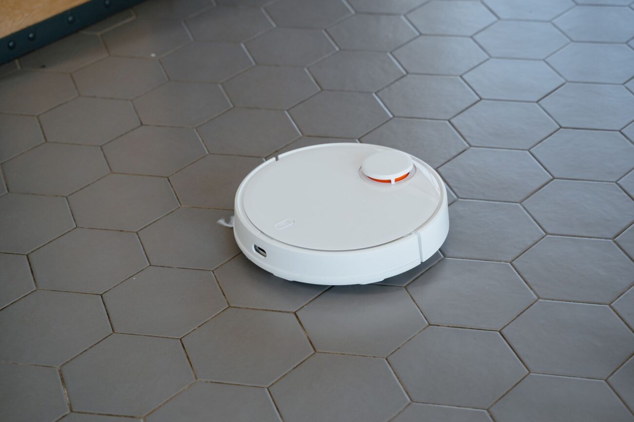 Clean Smarter: The Best Robot Vacuums for 2026 Revealed 1 A modern best robot vacuums cleaning a living room floor