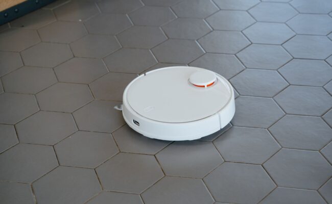 Clean Smarter: The Best Robot Vacuums for 2026 Revealed 3 A modern best robot vacuums cleaning a living room floor