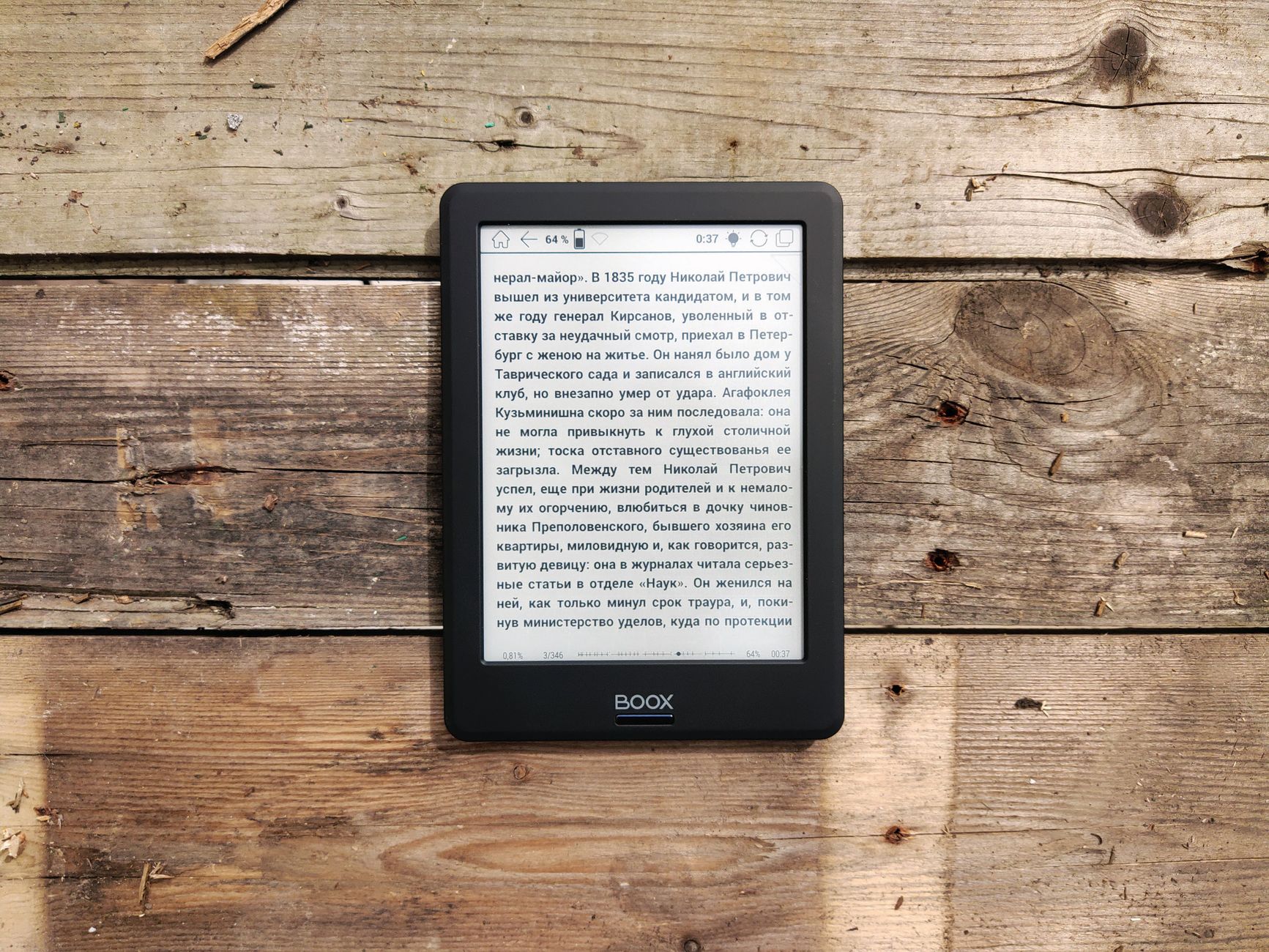 E-Reader vs. Tablet: Which Should You Buy? 2 A person comparing an e-reader vs. tablet side by side, highlighting the differences in screen technology.