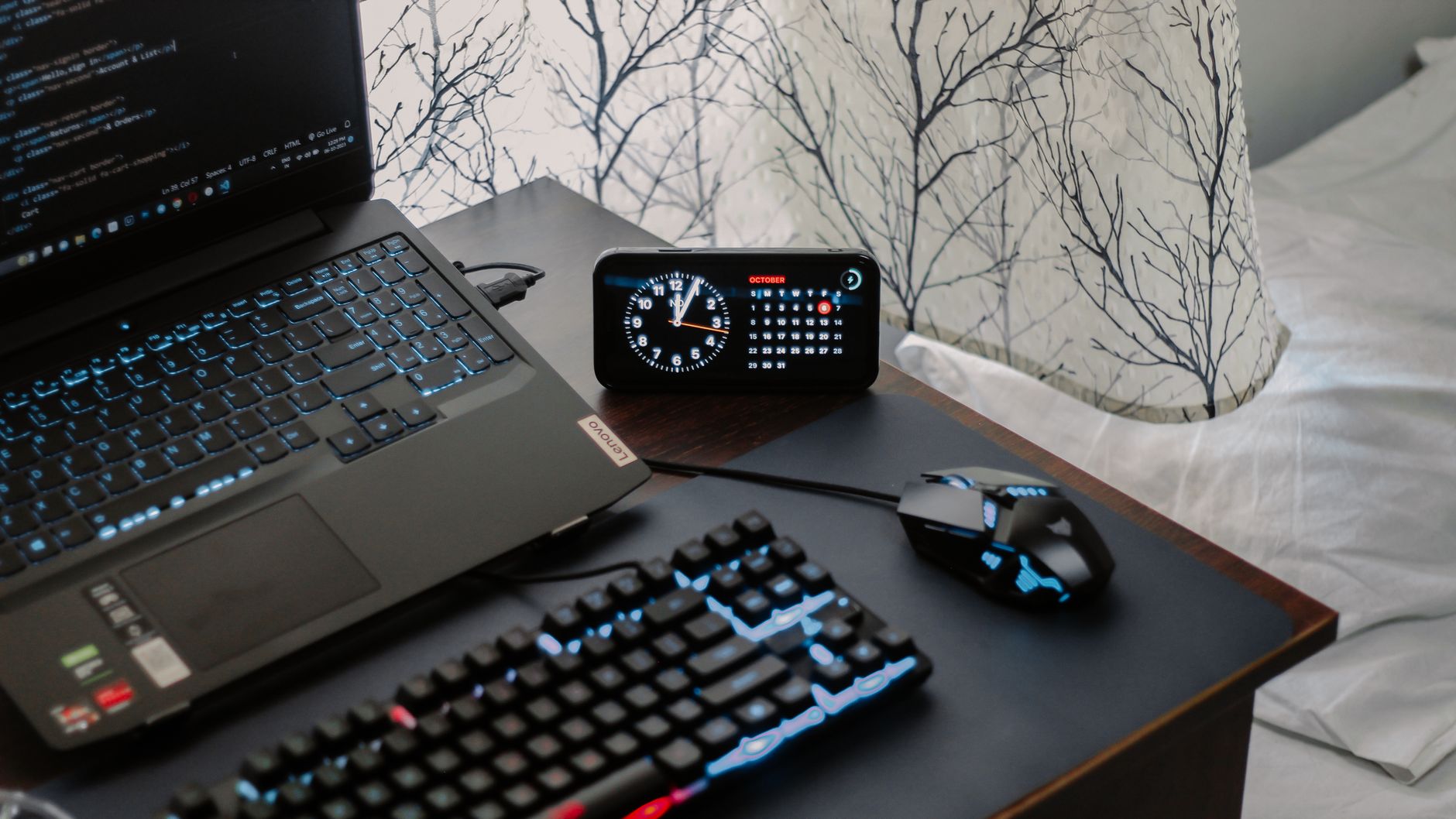 A gamer using a gaming laptop for portable gaming.