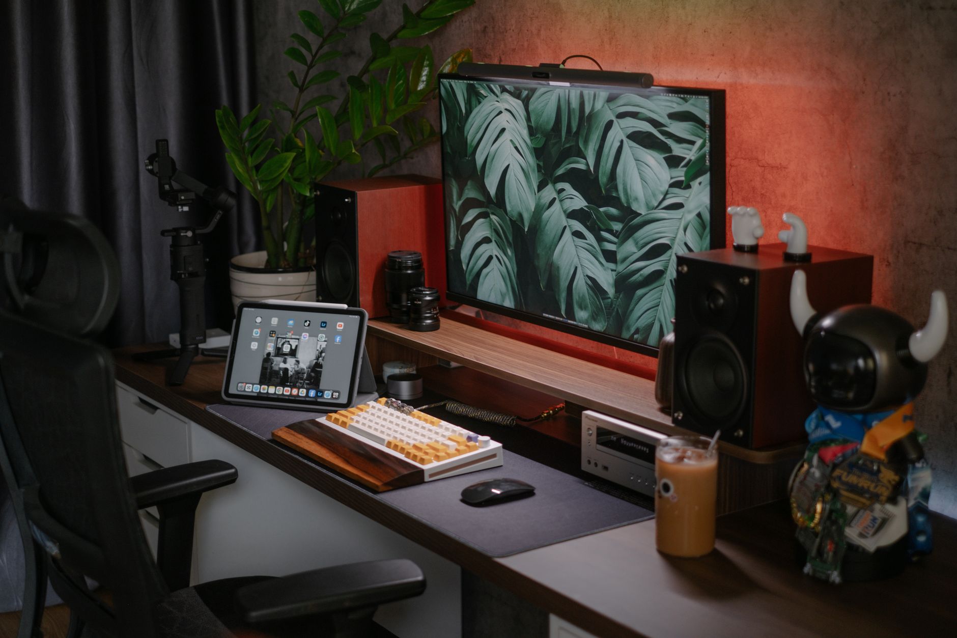 NAS vs. Server: Which Should You Buy for Your Home or Small Business? 7 Person working in a home office with tech setup
