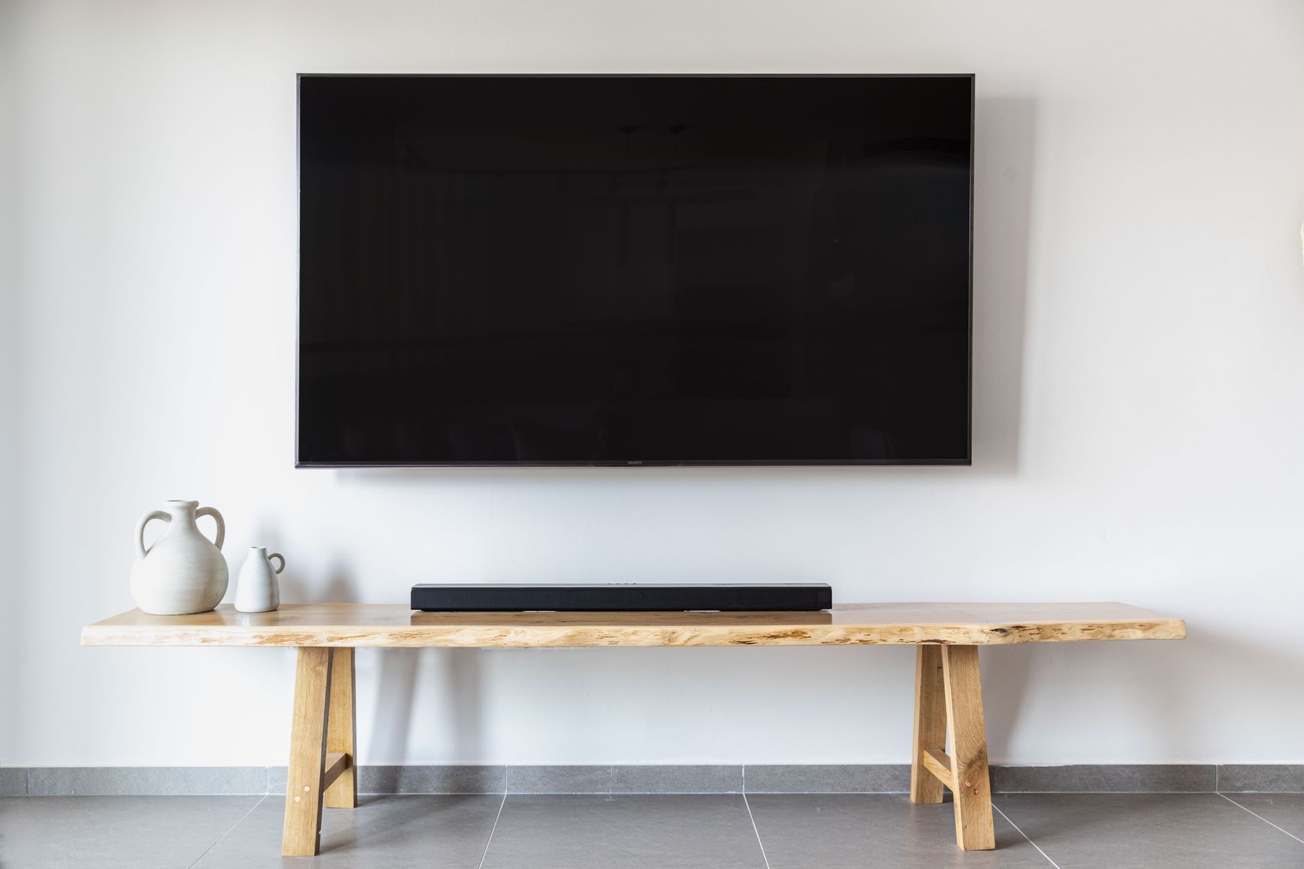 Soundbar vs home theatre setup in a modern living room