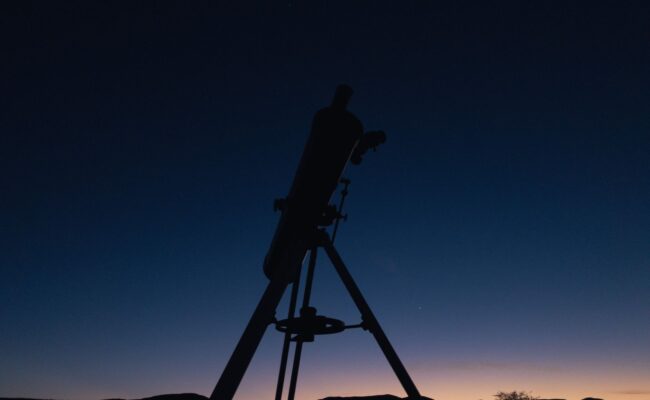 Telescope vs. Binoculars: Which Optics Should You Buy? 3 stargazing with telescope vs binoculars under night sky
