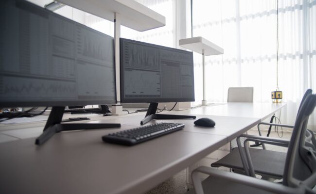 4K Monitor vs. 1440p Monitor: Which Should You Buy? 2 Comparing a 4k monitor vs. 1440p monitor setup on a modern desk