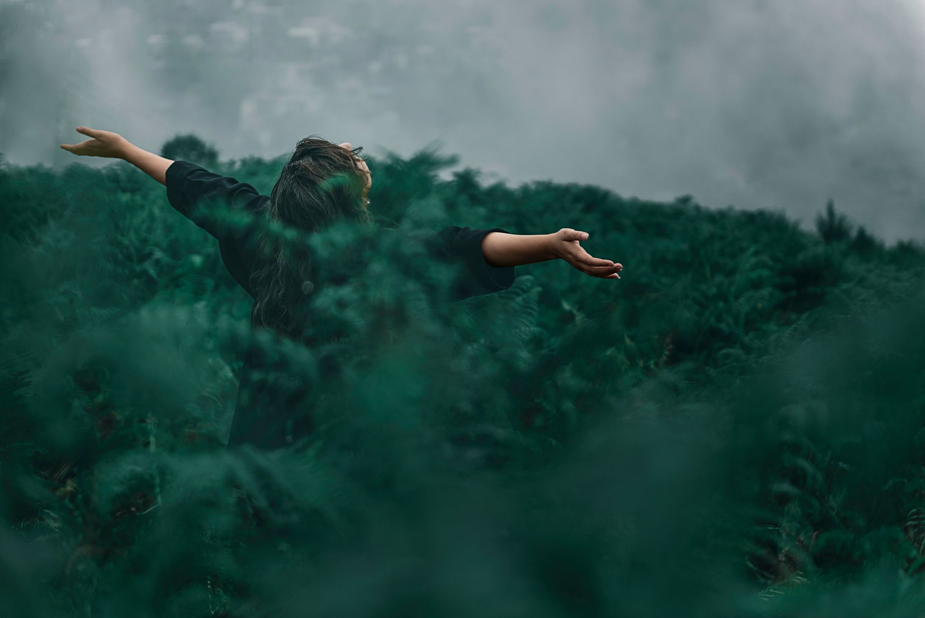 Breathe Easier: The Best Air Purifiers for 2026 Revealed 2 A woman enjoying fresh air, thanks to the best air purifiers.
