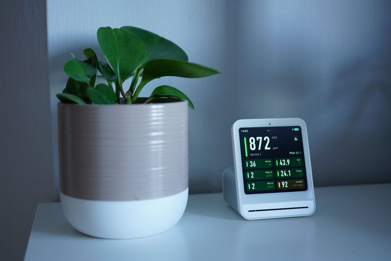 Breathe Easier: The Best Air Purifiers for 2026 Revealed 1 A woman enjoying fresh air, thanks to the best air purifiers.