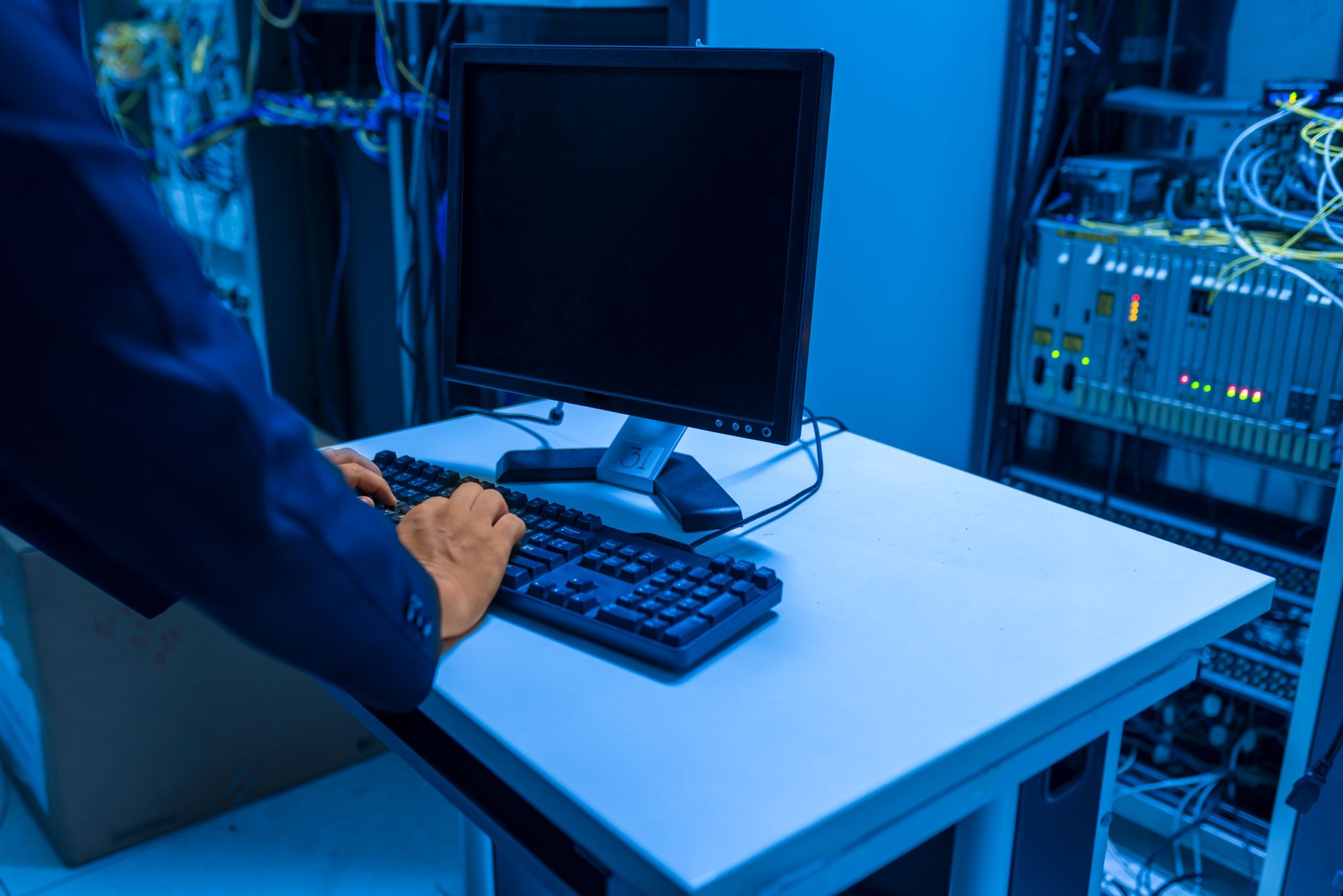 Understanding BT Smart Hub 2 Light Indicators: Flashing Purple, Orange, and Red Explained 3 A person checking network cables connected to a router