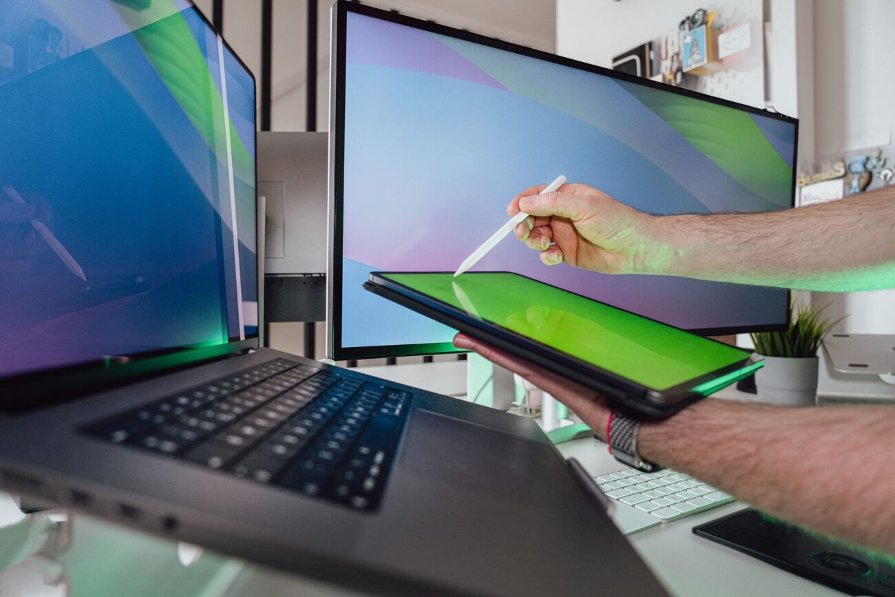The Best Portable Monitors for 2026: Your Ultimate Mobile Display Guide 1 Portable monitors - A person working remotely with a portable monitor setup, enhancing productivity.