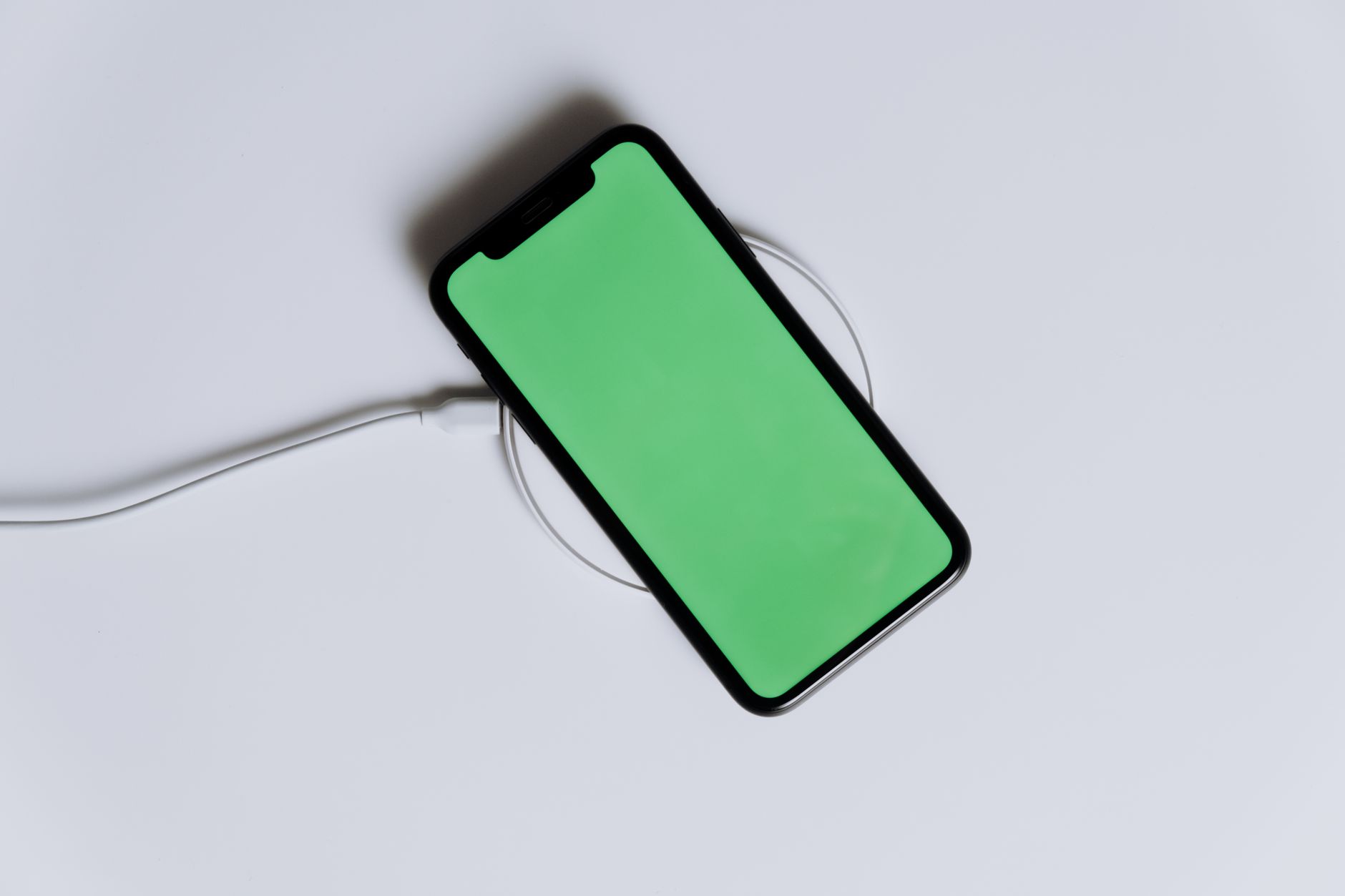 Best Wireless Chargers for 2026: Top Picks for Fast, Reliable Charging 3 User demonstrating how to use a wireless charger for 2026 smartphones